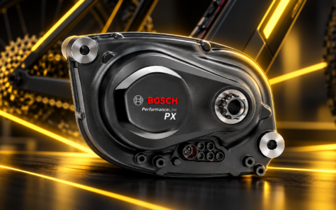 Silnik Bosch Performance Line PX do roweru elektrycznego na dynamicznym tle technicznym