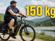 Rower elektryczny z cięższym rowerzystą i sakwami oraz napisem 150 kg