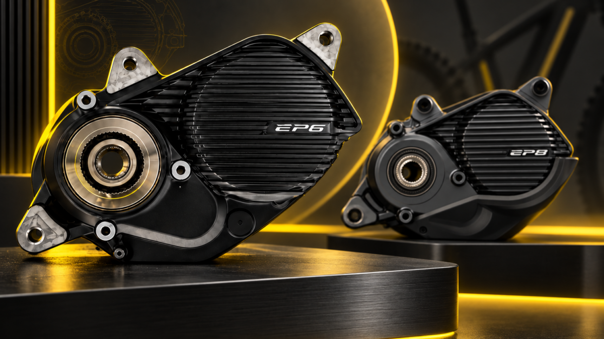 Shimano EP6 i EP8 – porównanie silników do roweru elektrycznego na ciemnym tle w żółto-czarnej kolorystyce